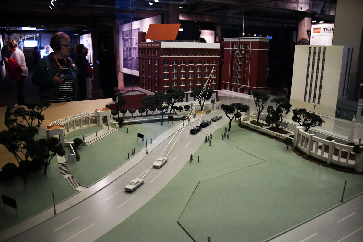 327 This exhibit depicts the shots from the 6th floor school depository building as they hit the president's motorcade in Dealey Plaza.JPG